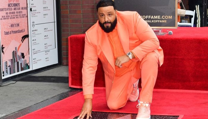 DJ Khaled poses on Hollywood Walk of Fame Star in Los Angeles where he received the 2,719th Star in the category of Recording.