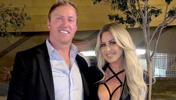 Kim Zolciak and Kroy Biermann reunite at church with their children, marking their first public appearance since the split.