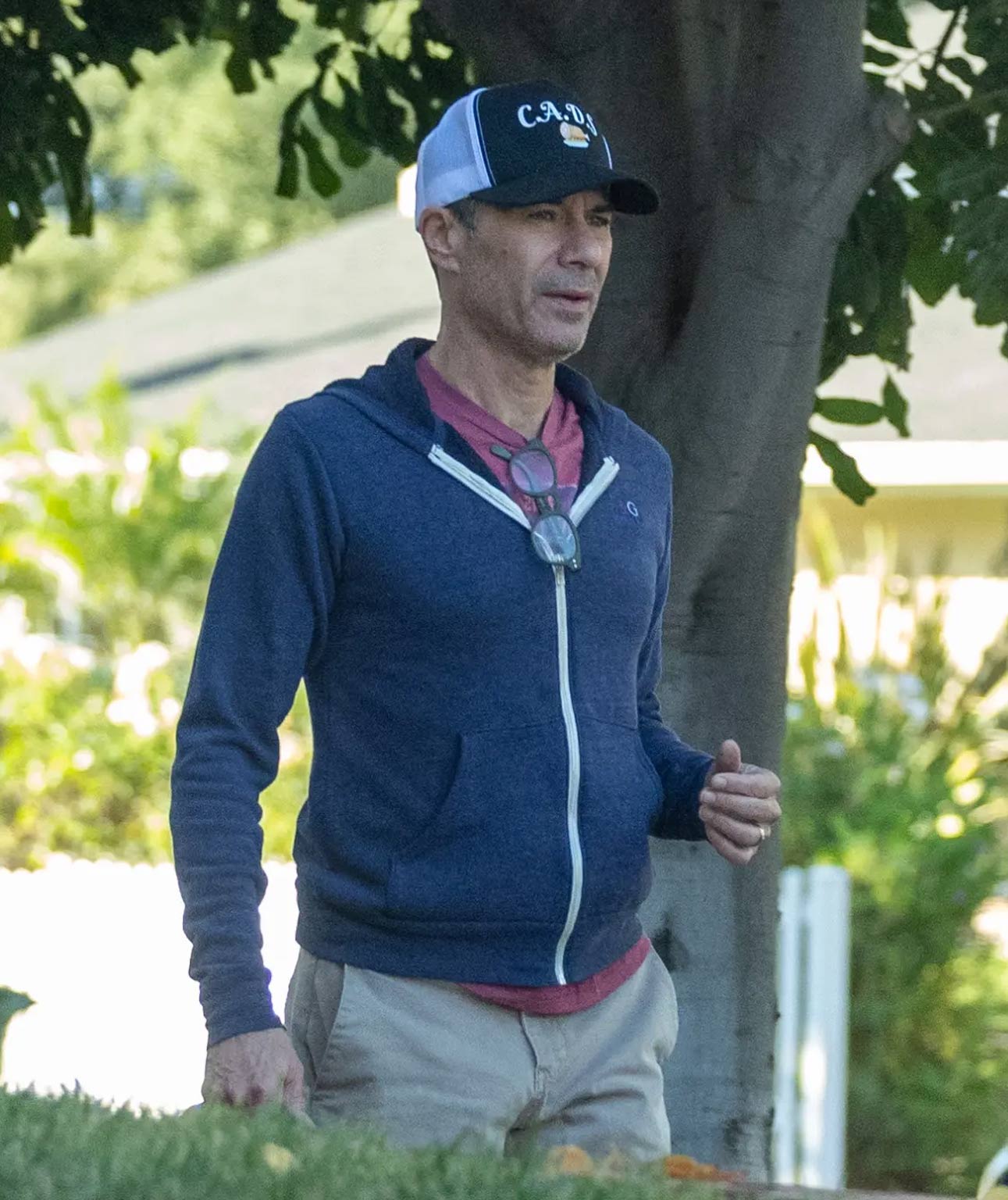 Eric McCormack out for a walk with his ring on after wife filed for divorce